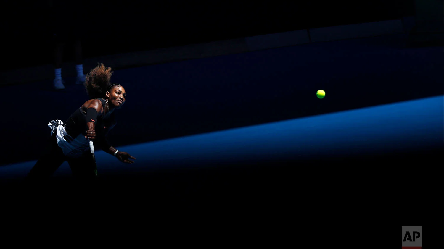United States' Serena Williams serves to Britain's Johanna Konta during their quarterfinal at the Australian Open tennis championships in Melbourne, Australia, Wednesday, Jan. 25, 2017. (AP Photo/Kin Cheung)