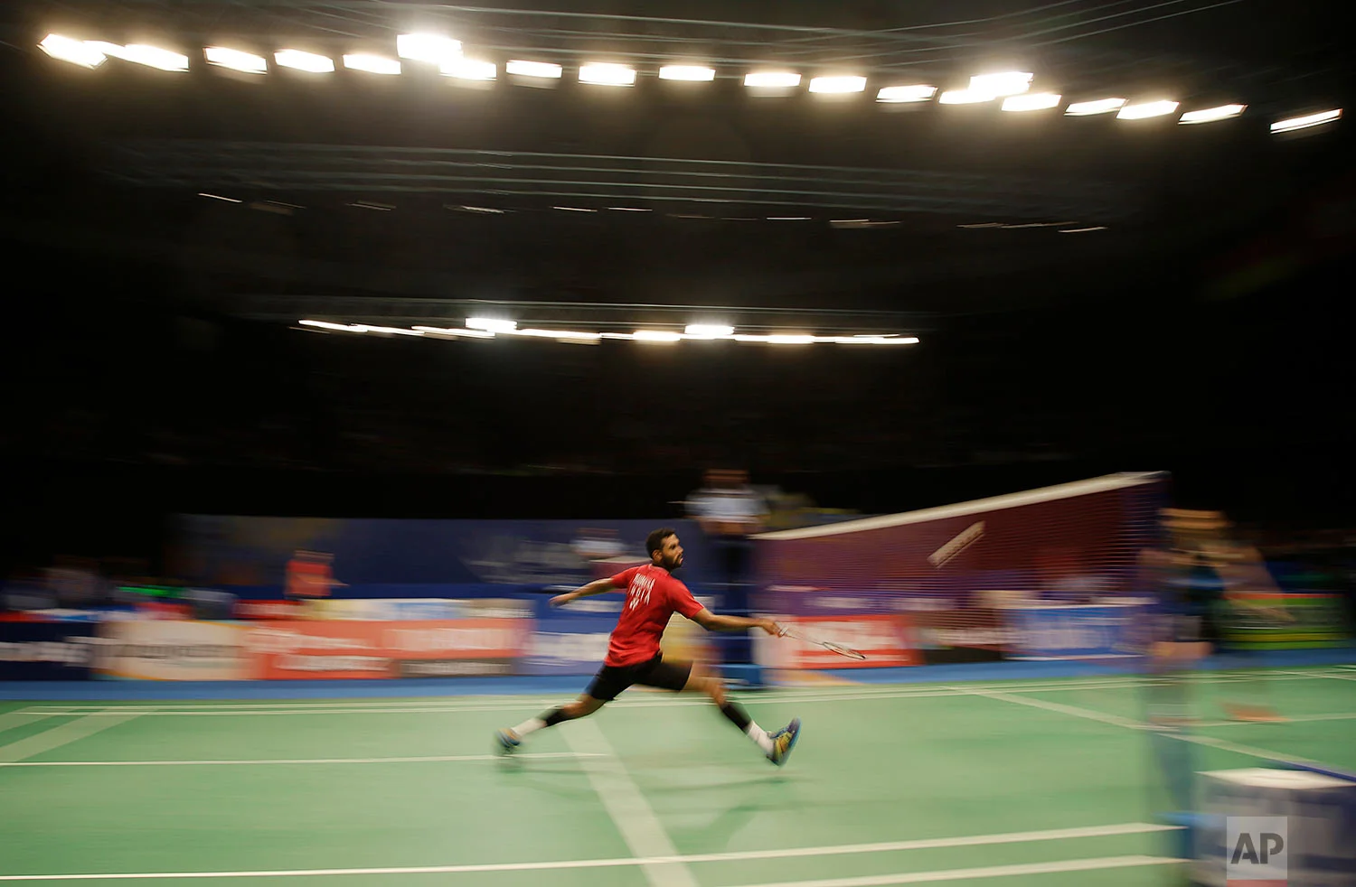 In this Thursday, June 15, 2017, photo, India's HS Prannoy plays against Malaysia's Lee Chong Wei during the second round of Indonesia Open badminton championship in Jakarta, Indonesia. (AP Photo/Dita Alangkara)