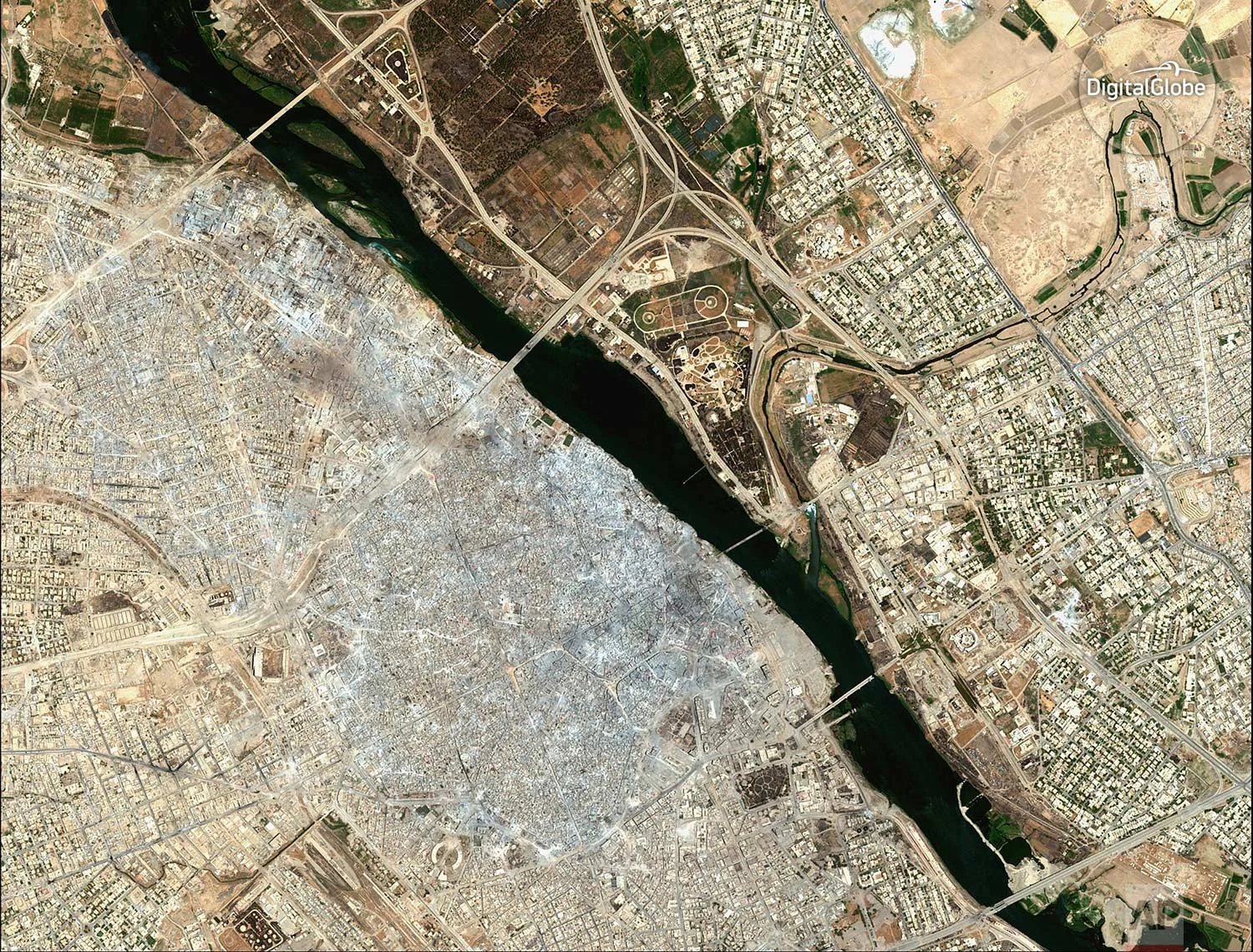 This satellite image released by DigitalGlobe shows the Old City of Mosul, Iraq on July 8, 2017 after a punishing nine month battle to oust Islamic State militants. (DigitalGlobe via AP)