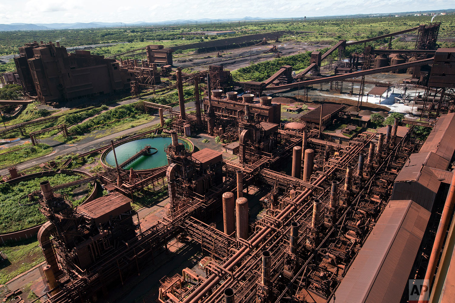  In this Nov. 7, 2017 photo, a Sidor steel plant that was never operational stands rusting away, in Ciudad Guayana, Bolivar state, Venezuela. Production this year at the state-run Sidor, Venezuela's largest steelmaker, is expected to reach barely 20 