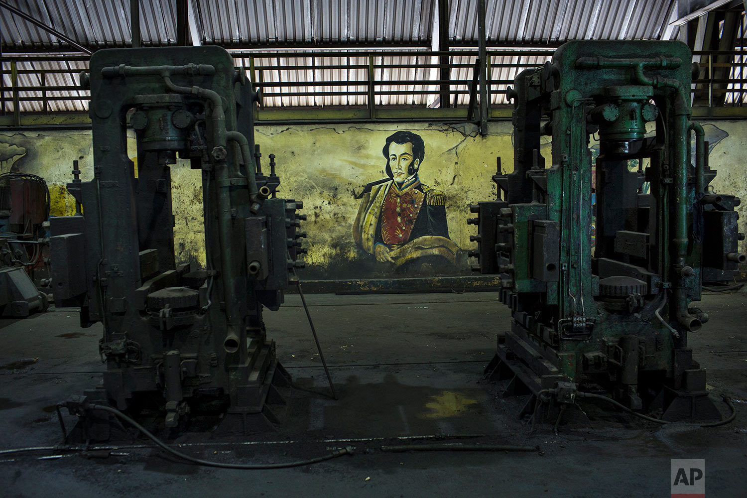  In this Nov. 7, 2017 photo, a painting of Latin America's independence hero Simon Bolivar, is seen at Sidor's Alambron plant, in Ciudad Guayana, Bolivar state, Venezuela. Production this year at state-run Sidor, Venezuela's largest steelmaker, is ex