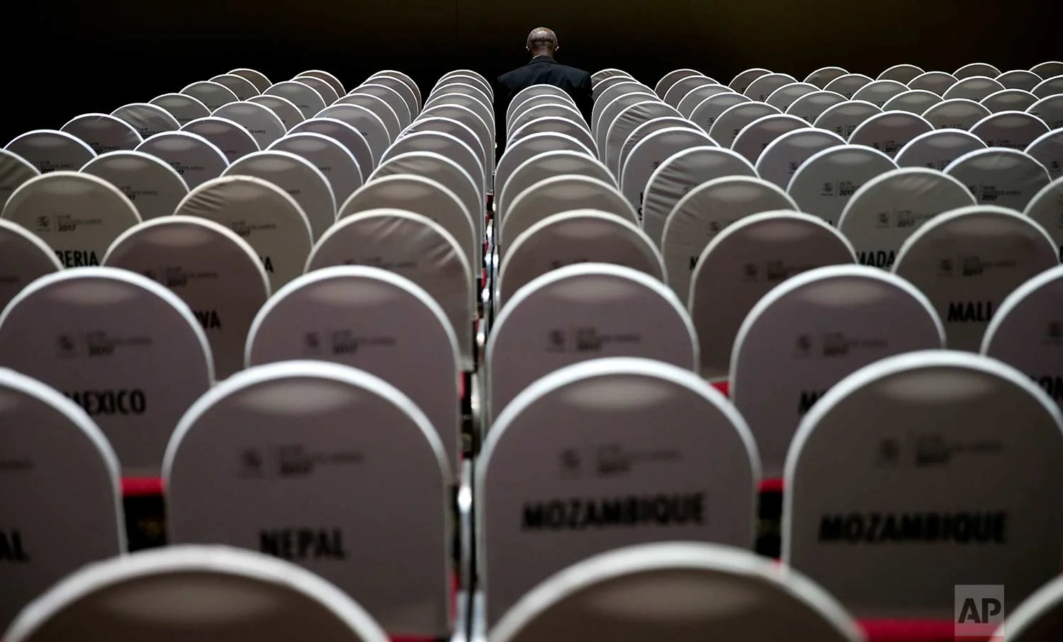 A delegate sits waiting for the start of the Ministerial Conference of the World Trade Organization in Buenos Aires, Argentina, Monday, Dec. 11, 2017. (AP Photo/Natacha Pisarenko)