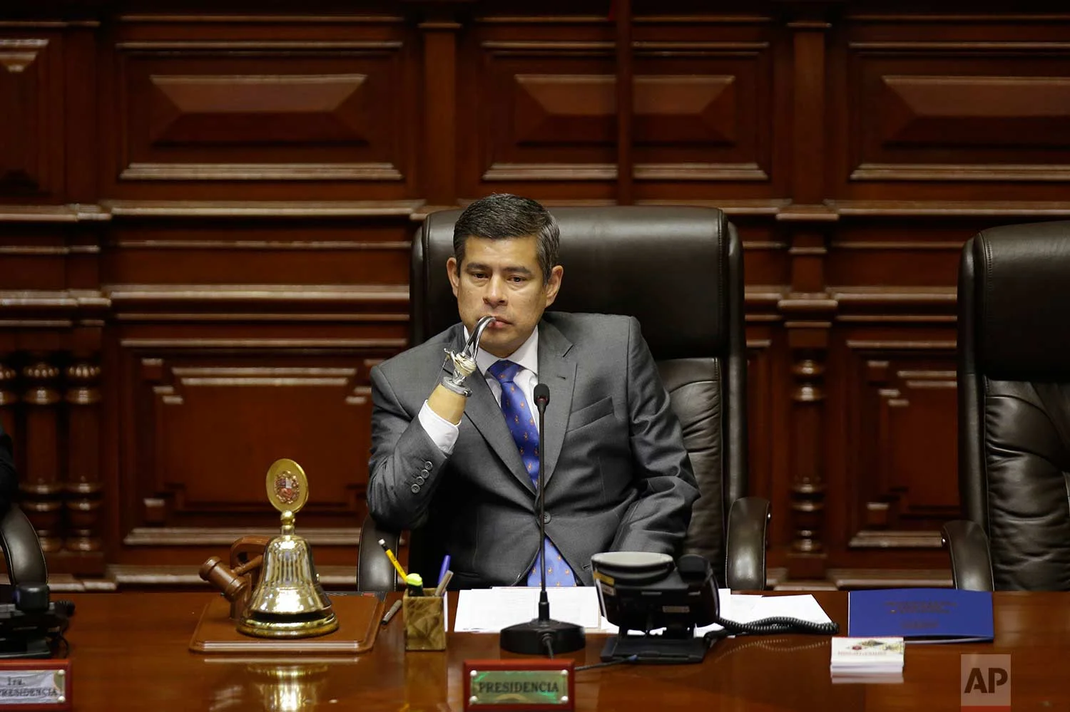 National Congress President Luis Galarreta presides over a special session on whether to initiate impeachment proceeding against the country's president, in Lima, Peru, Friday, Dec. 15, 2017. (AP Photo/Martin Mejia)