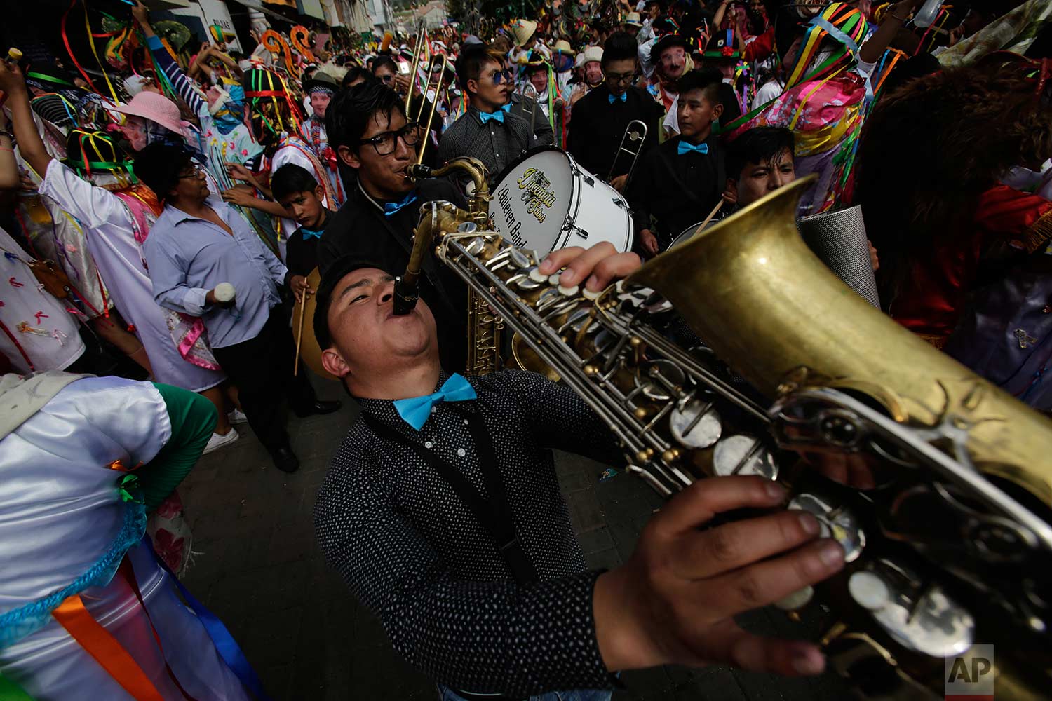  Musicians perform during the traditional New Year's festival known as "La Diablada", in Pillaro, Ecuador, Friday, Jan. 5, 2018. (AP Photo/Dolores Ochoa) 
