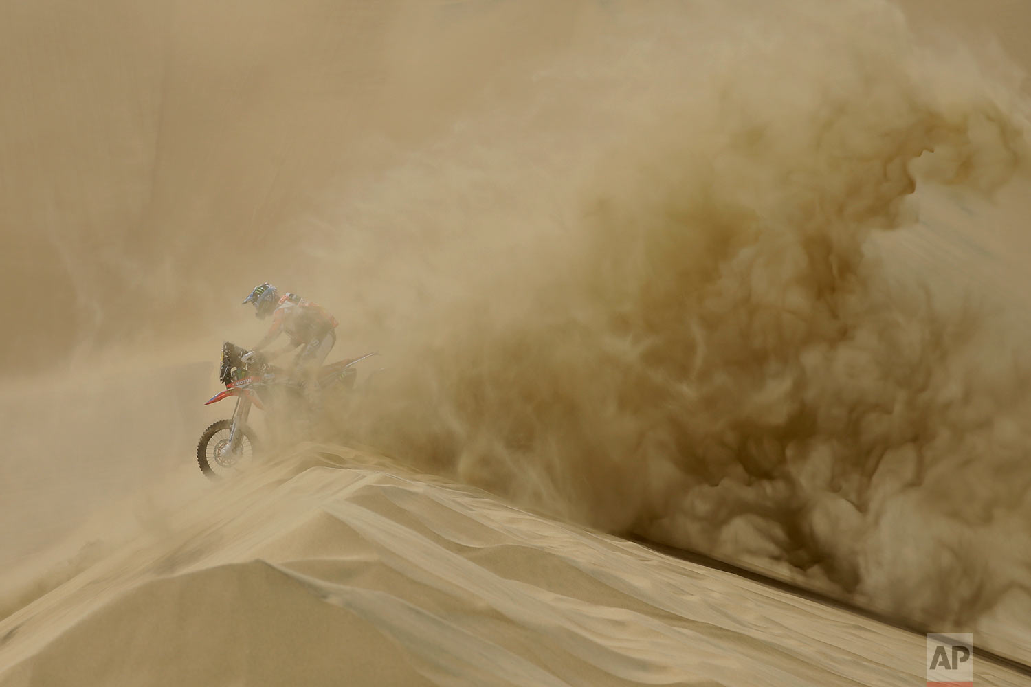  In this Saturday, Jan. 6, 2018 photo, Ricky Brabec, of the United States, rides his Honda motorbike during the first stage of the Dakar Rally between Lima and Pisco, Peru. (AP Photo/Ricardo Mazalan)&nbsp; |&nbsp; See these photos on AP Images  