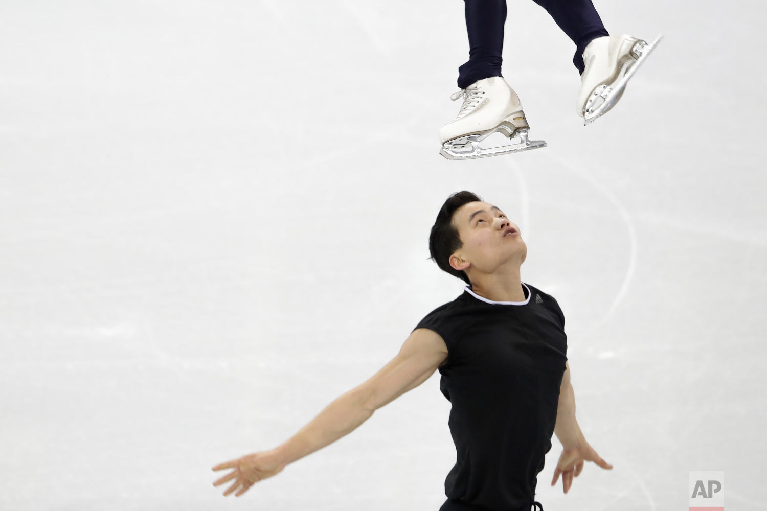 North Korea's Ryom Tae Ok and Kim Ju Sik, perform during a Pairs Figure Skating training session prior to the 2018 Winter Olympics in Gangneung, South Korea, Sunday, Feb. 4, 2018. (AP Photo/Felipe Dana)