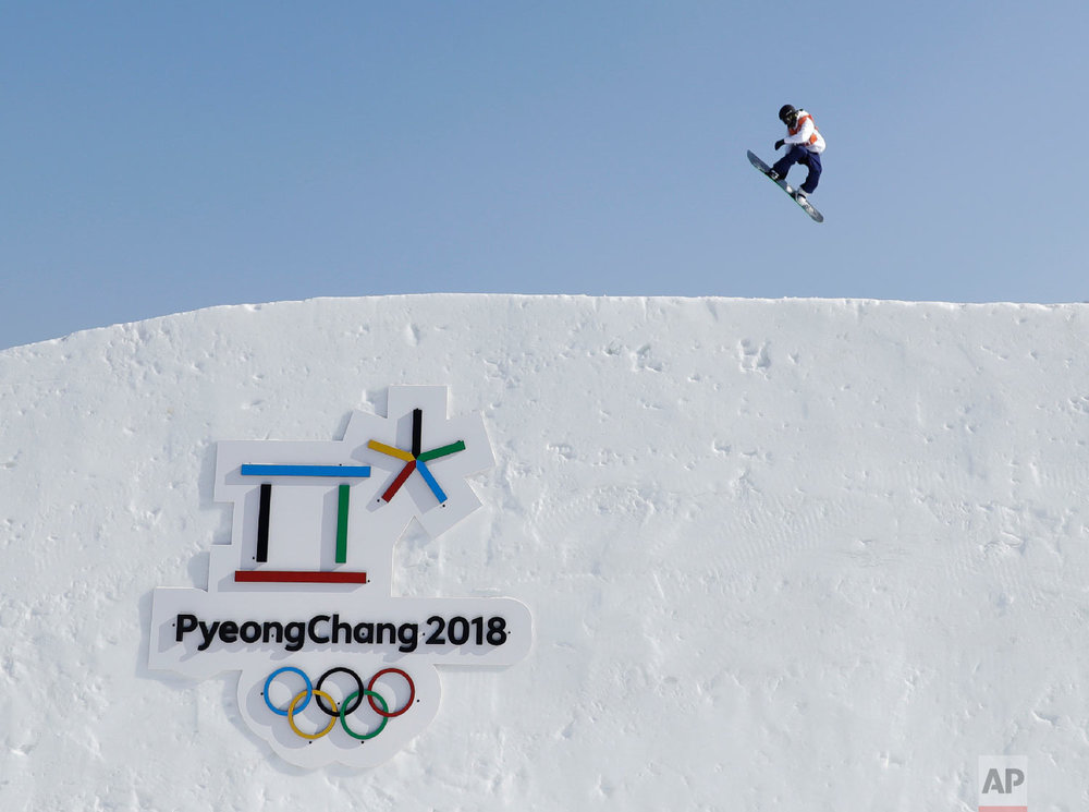  A snowboarder trains ahead for the 2018 Winter Olympics in Pyeongchang, South Korea, Thursday, Feb. 8, 2018. (AP Photo/Gregory Bull) 