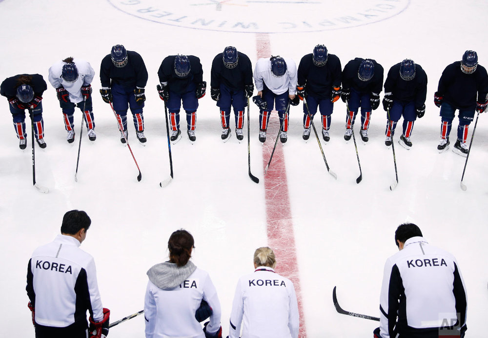  The combined Korean women's ice hockey players bow to their coaching staff after a practice session prior to the 2018 Winter Olympics in Gangneung, South Korea, Monday, Feb. 5, 2018. (AP Photo/Jae C. Hong) 
