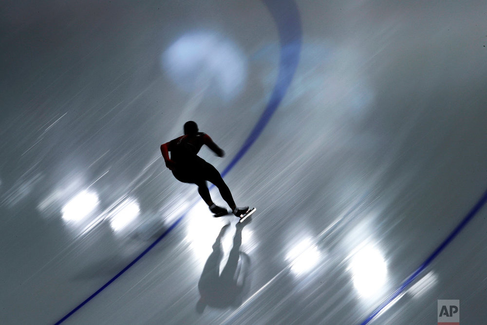  A skater practices at the Gangneung Oval during a speed skating training session prior to the 2018 Winter Olympics in Gangneung, South Korea, Thursday, Feb. 8, 2018. (AP Photo/John Locher) 