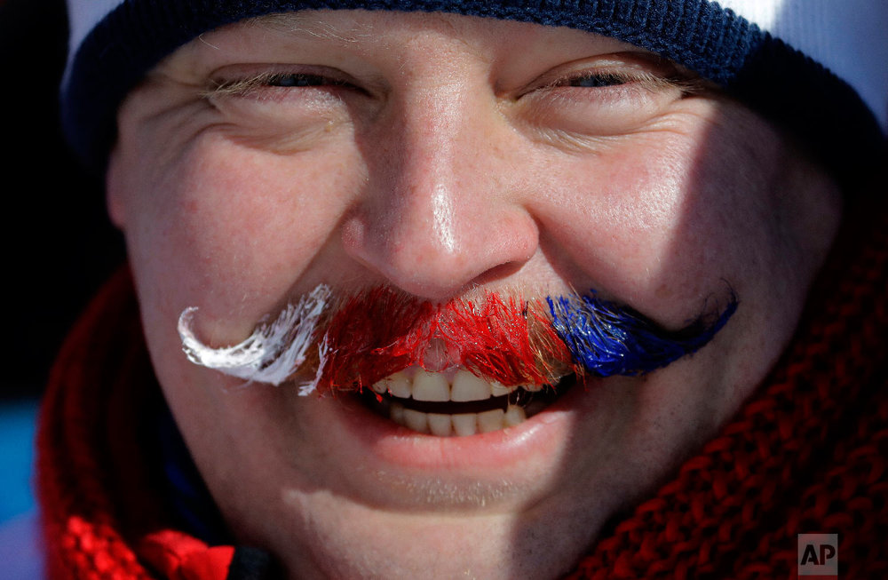  A fan of Sarka Pancochova, of the Czech Republic, waits for competition to begin prior to the women's slopestyle final at Phoenix Snow Park at the 2018 Winter Olympics in Pyeongchang, South Korea, Monday, Feb. 12, 2018. (AP Photo/Lee Jin-man) 