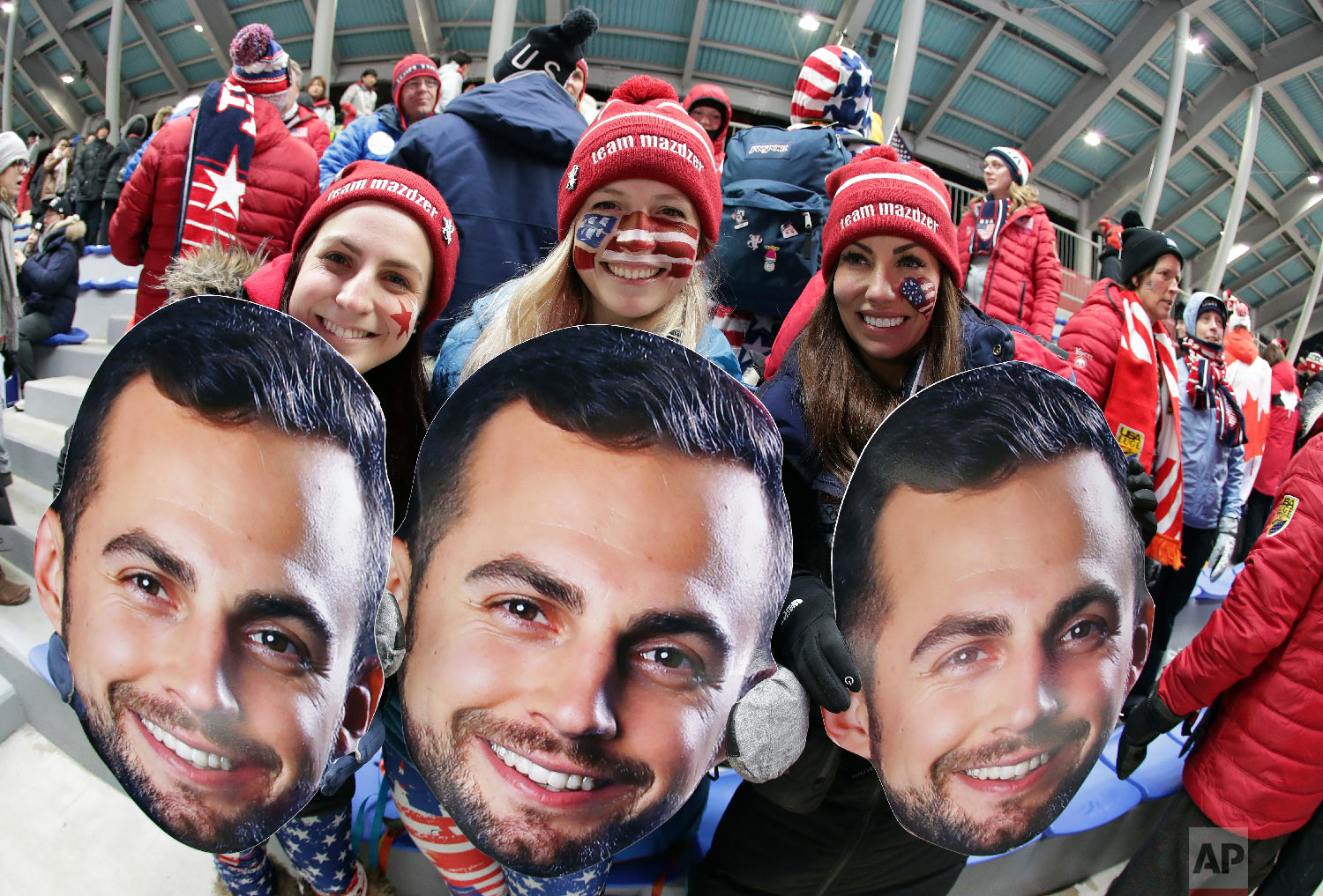  Supporters of luger Chris Mazdzer, of the United States, wait for the first run to start at the 2018 Winter Olympics in Pyeongchang, South Korea, Saturday, Feb. 10, 2018. (AP Photo/Michael Sohn) 