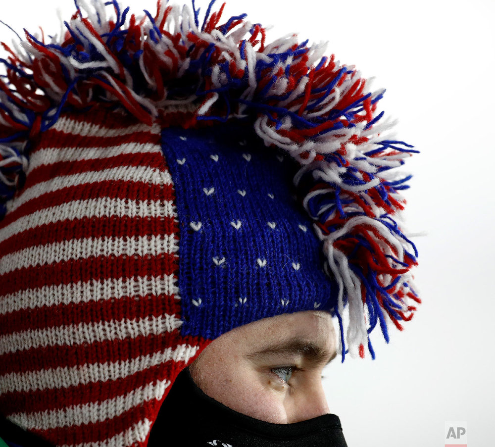  A United States fan watches the men's 12.5-kilometer biathlon pursuit at the 2018 Winter Olympics in Pyeongchang, South Korea, Monday, Feb. 12, 2018. (AP Photo/Charlie Riedel) 