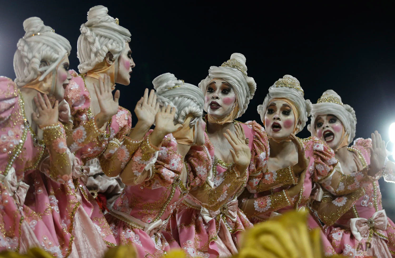 Performers from the Uniao da Ilha samba school parade during Carnival celebrations at the Sambadrome in Rio de Janeiro, Brazil, early Tuesday, Feb. 13, 2018. (AP Photo/Silvia Izquierdo)
