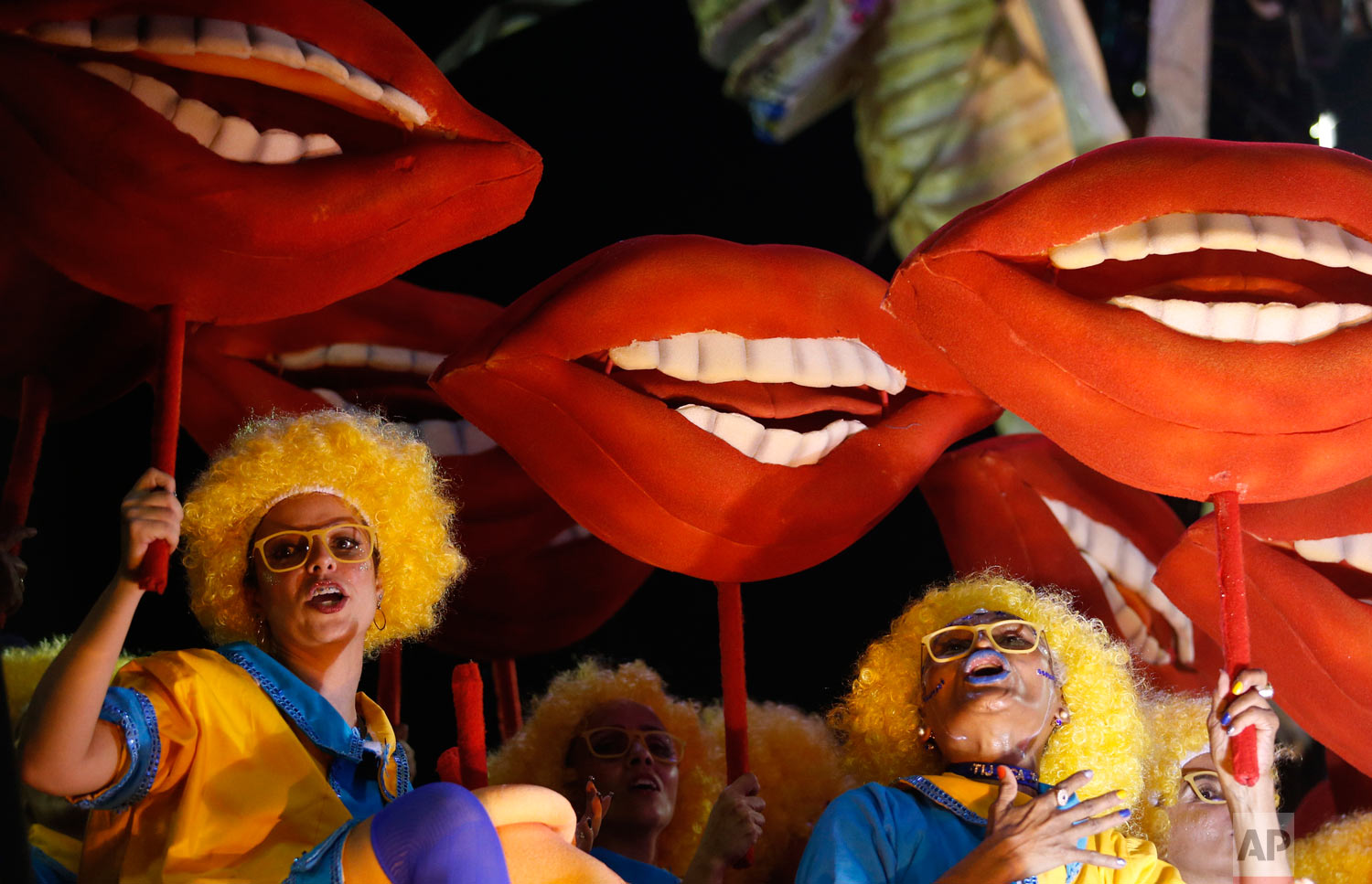 Performers from the Unidos da Tijuca samba school parade during Carnival celebrations at the Sambadrome in Rio de Janeiro, Brazil, Monday, Feb. 12, 2018. (AP Photo/Silvia Izquierdo)