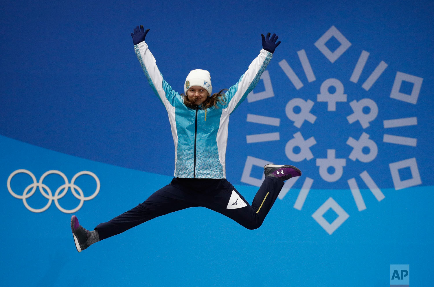  Women's moguls bronze medalist Yulia Galysheva, of Kazakhstan, celebrates during the medals ceremony at the 2018 Winter Olympics in Pyeongchang, South Korea, Monday, Feb. 12, 2018. (AP Photo/Jae C. Hong) 