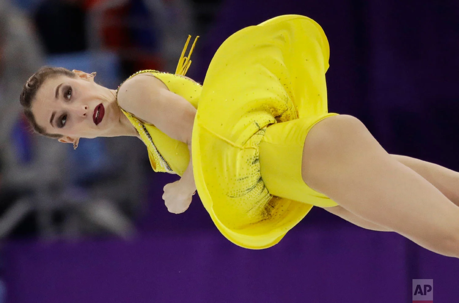 Russian skater Kristina Astakhova is airborne as she performs with partner Alexei Rogonov in the pairs free skate figure skating final in the Gangneung Ice Arena at the 2018 Winter Olympics in Gangneung, South Korea, Thursday, Feb. 15, 2018. (AP Photo/Bernat Armangue)