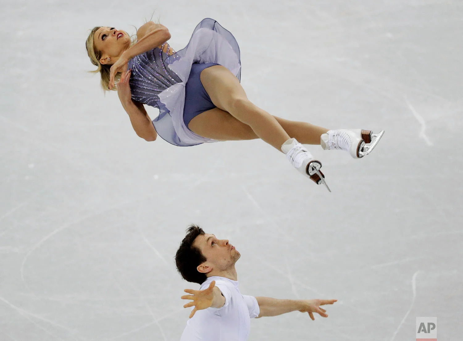 Kirsten Moore-Towers and Michael Marinaro, of Canada, perform in the pairs free skate figure skating final in the Gangneung Ice Arena at the 2018 Winter Olympics in Gangneung, South Korea, Thursday, Feb. 15, 2018. (AP Photo/David J. Phillip)