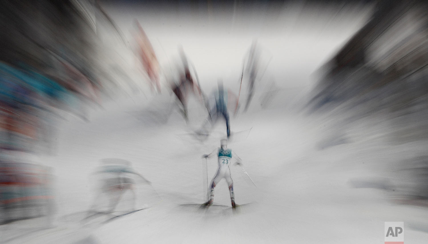 Joergen Graabak, of Norway, and other athletes climbed a hill during the 10km cross-country skiing portion of the nordic combined event at the 2018 Winter Olympics in Pyeongchang, South Korea, Wednesday, Feb. 14, 2018. (AP Photo/Charlie Riedel)