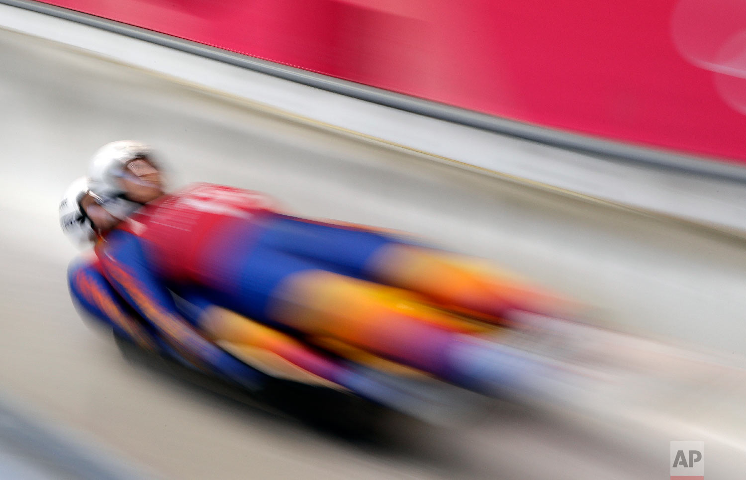 Cosmin Atodiresei and Stefan Musei of Romania start a run during the doubles luge training at the 2018 Winter Olympics in Pyeongchang, South Korea, Monday, Feb. 12, 2018. (AP Photo/Wong Maye-E)