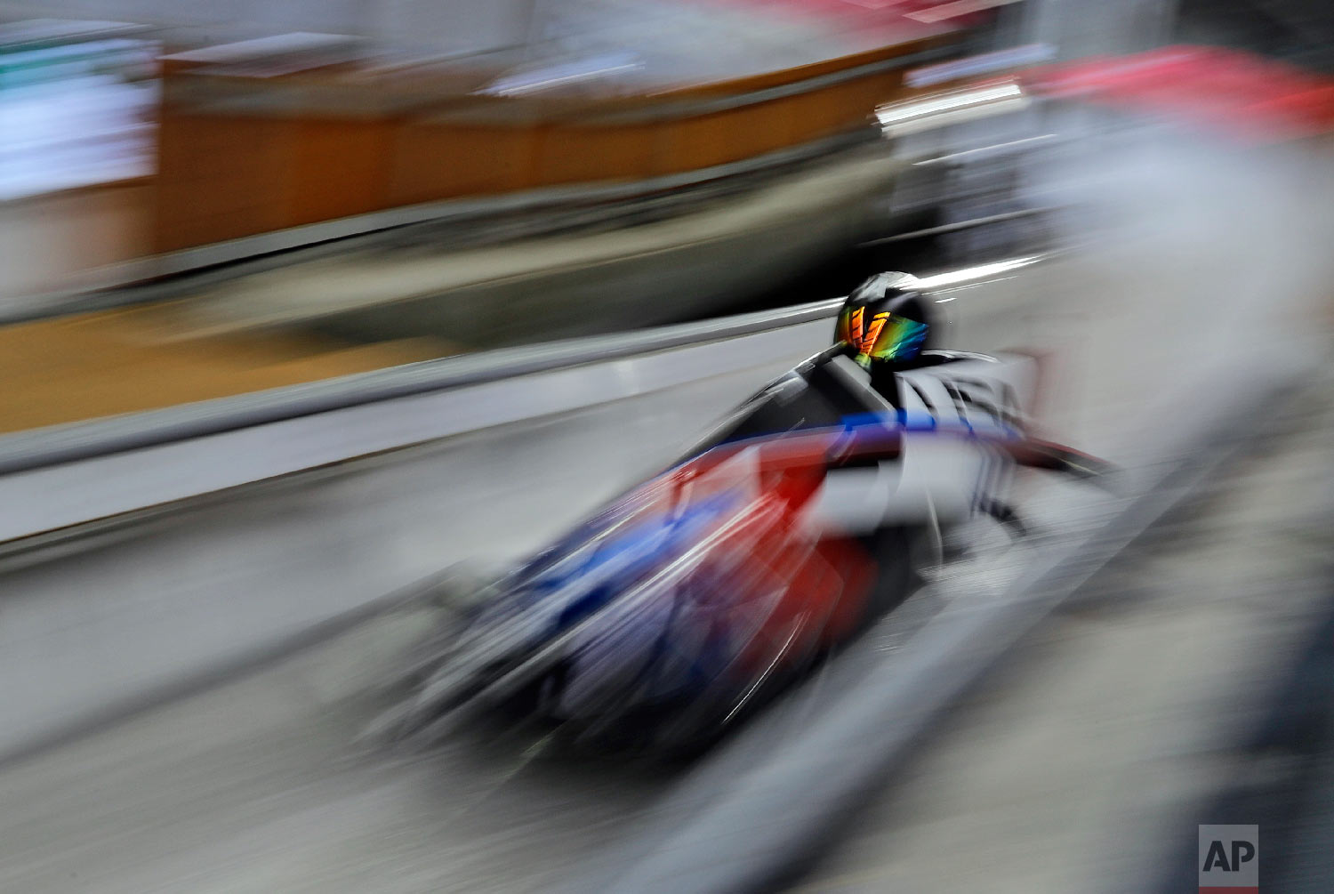 Driver Codie Bascue and Samuel McGuffie of the United States take a practice run during training for the two-man bobsled at the 2018 Winter Olympics in Pyeongchang, South Korea, Thursday, Feb. 15, 2018. (AP Photo/Wong Maye-E)
