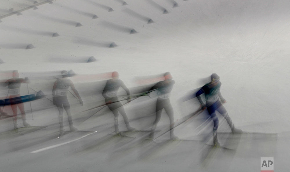  Athletes compete in the 10km cross-country skiing portion of the nordic combined event at the 2018 Winter Olympics in Pyeongchang, South Korea, Wednesday, Feb. 14, 2018. (AP Photo/Charlie Riedel) 