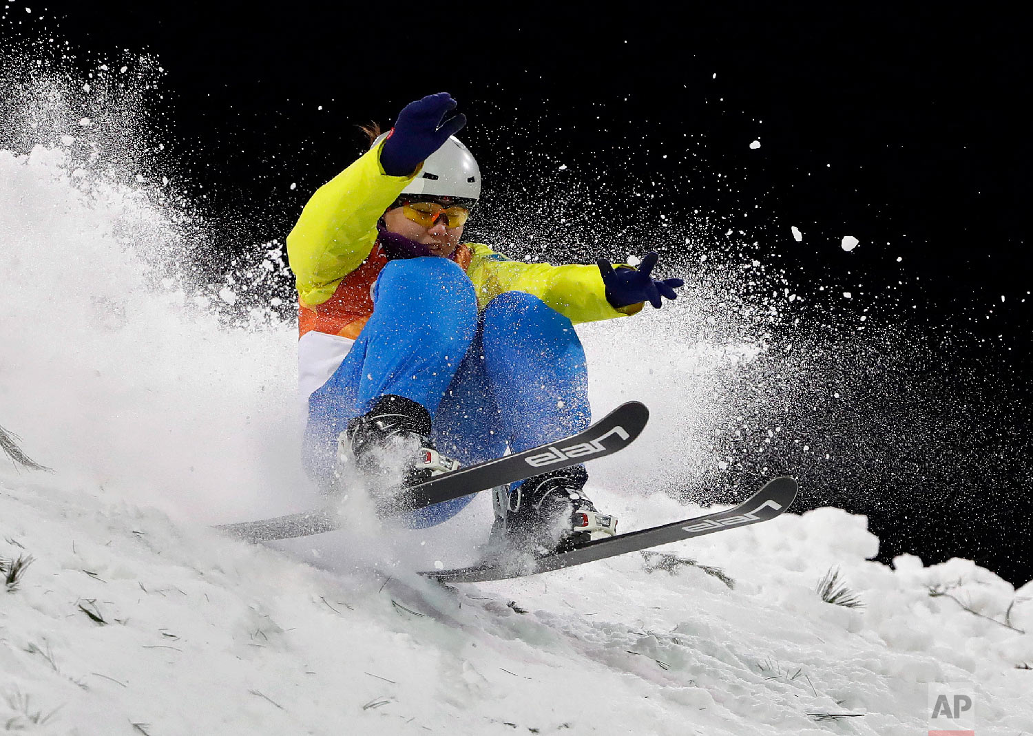  Ayana Zholdas, of Kazakhstan, crashes during the women's aerials qualifying at Phoenix Snow Park at the 2018 Winter Olympics in Pyeongchang, South Korea, Thursday, Feb. 15, 2018. (AP Photo/Gregory Bull) 