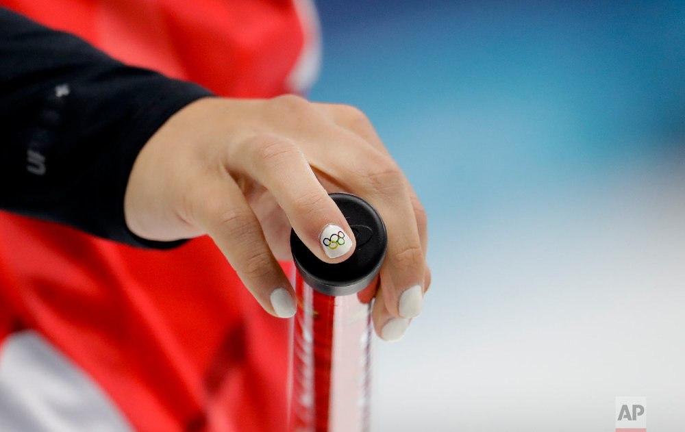  Canada's skip Rachel Homan holds her broom during a women's curling match against Denmark at the 2018 Winter Olympics in Gangneung, South Korea, Friday, Feb. 16, 2018. (AP Photo/Natacha Pisarenko) 