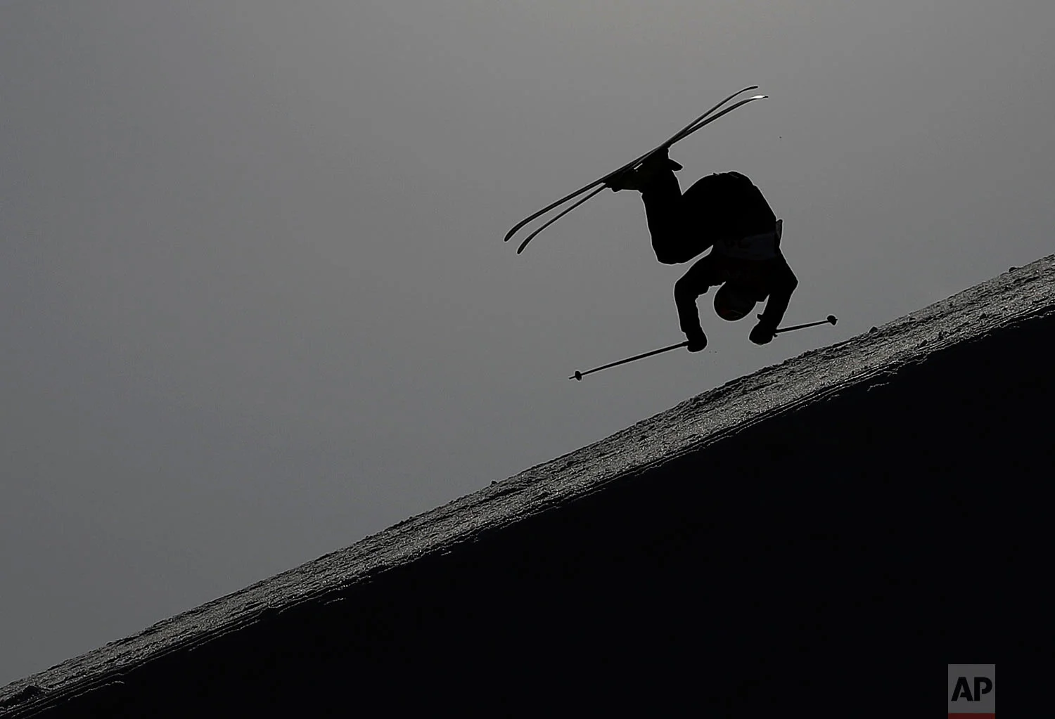 Christian Nummedal, of Norway, jumps during the men's slopestyle qualifying at Phoenix Snow Park at the 2018 Winter Olympics in Pyeongchang, South Korea, Sunday, Feb. 18, 2018. (AP Photo/Kin Cheung)