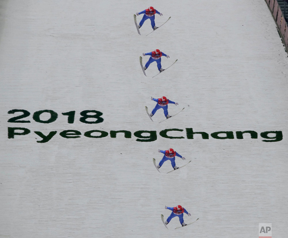  In this multiple exposure photo, Yoshito Watabe, of Japan, jumps during the trial jump of the nordic combined at the 2018 Winter Olympics in Pyeongchang, South Korea, Wednesday, Feb. 14, 2018. (AP Photo/Charlie Riedel) 