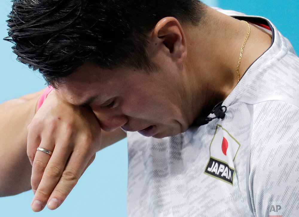  Japan's Tsuyoshi Yamaguchi cries after they lost their match against South Korea during the men's curling match at the 2018 Winter Olympics in Gangneung, South Korea, Wednesday, Feb. 21, 2018. (AP Photo/Aaron Favila) 