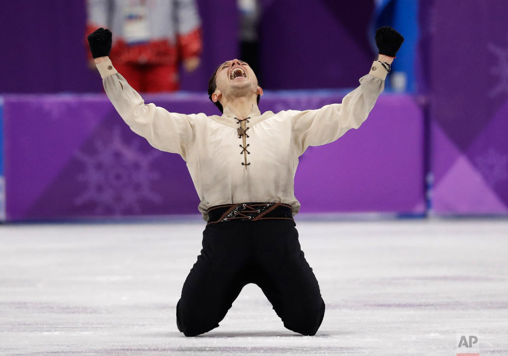  Alexei Bychenko of Israel reacts after his performance in the men's free figure skating final in the Gangneung Ice Arena at the 2018 Winter Olympics in Gangneung, South Korea, Saturday, Feb. 17, 2018. (AP Photo/Bernat Armangue) 