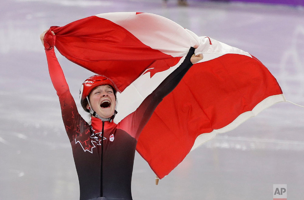  Kim Boutin of Canada celebrates after winning the bronze medal in the women's 1500 meters short track speedskating final in the Gangneung Ice Arena at the 2018 Winter Olympics in Gangneung, South Korea, Saturday, Feb. 17, 2018. (AP Photo/David J. Ph