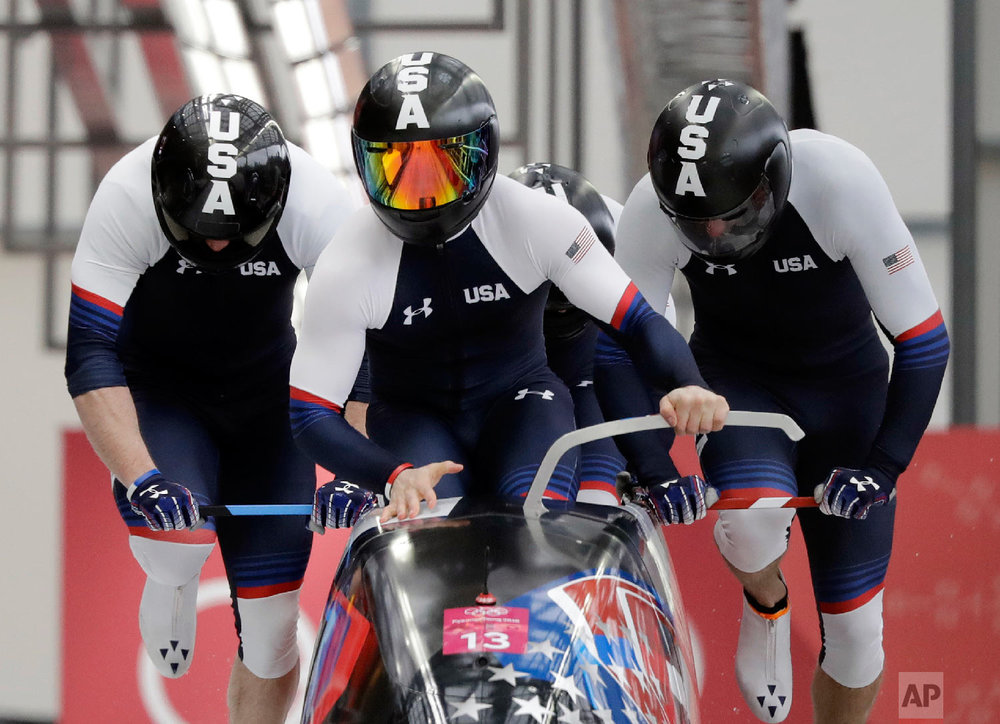  Driver Codie Bascue, Steven Langton, Samuel Mc Guffie and Evan Weinstock of the United States start their heat on the first day of four-man bobsled competition at the 2018 Winter Olympics in Pyeongchang, South Korea, Saturday, Feb. 24, 2018. (AP Pho