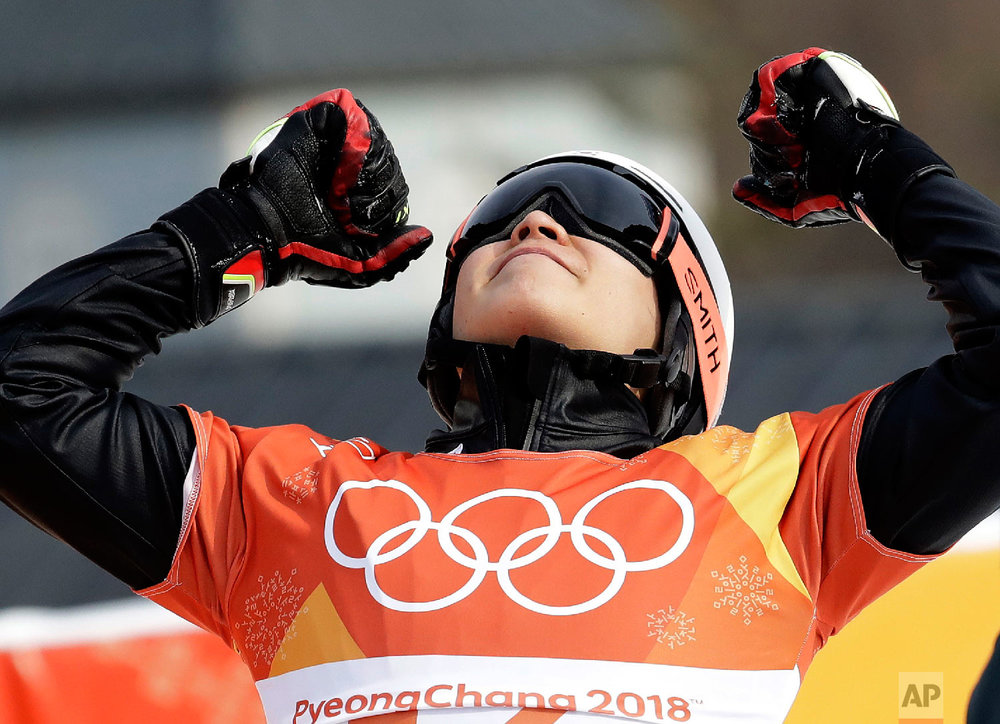  Silver medal winner Lee Sangho, of South Korea, celebrates after winning semifinal during the men's parallel giant slalom semifinal at Phoenix Snow Park at the 2018 Winter Olympics in Pyeongchang, South Korea, Saturday, Feb. 24, 2018. (AP Photo/Lee 