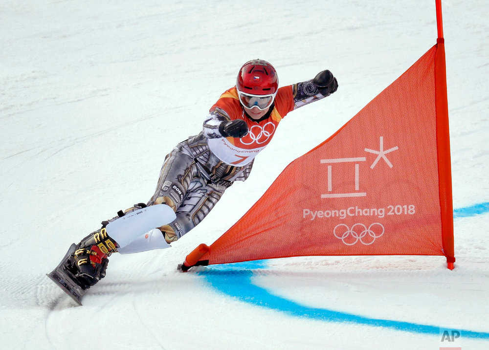  Ester Ledecka, of the Czech Republic, runs the course during the women's parallel giant slalom qualification run at Phoenix Snow Park at the 2018 Winter Olympics in Pyeongchang, South Korea, Saturday, Feb. 24, 2018. (AP Photo/Kin Cheung) 