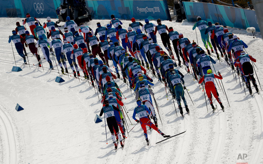  Competitors start the men's 50k cross-country skiing race at the 2018 Winter Olympics in Pyeongchang, South Korea, Saturday, Feb. 24, 2018.(AP Photo/Matthias Schrader) 