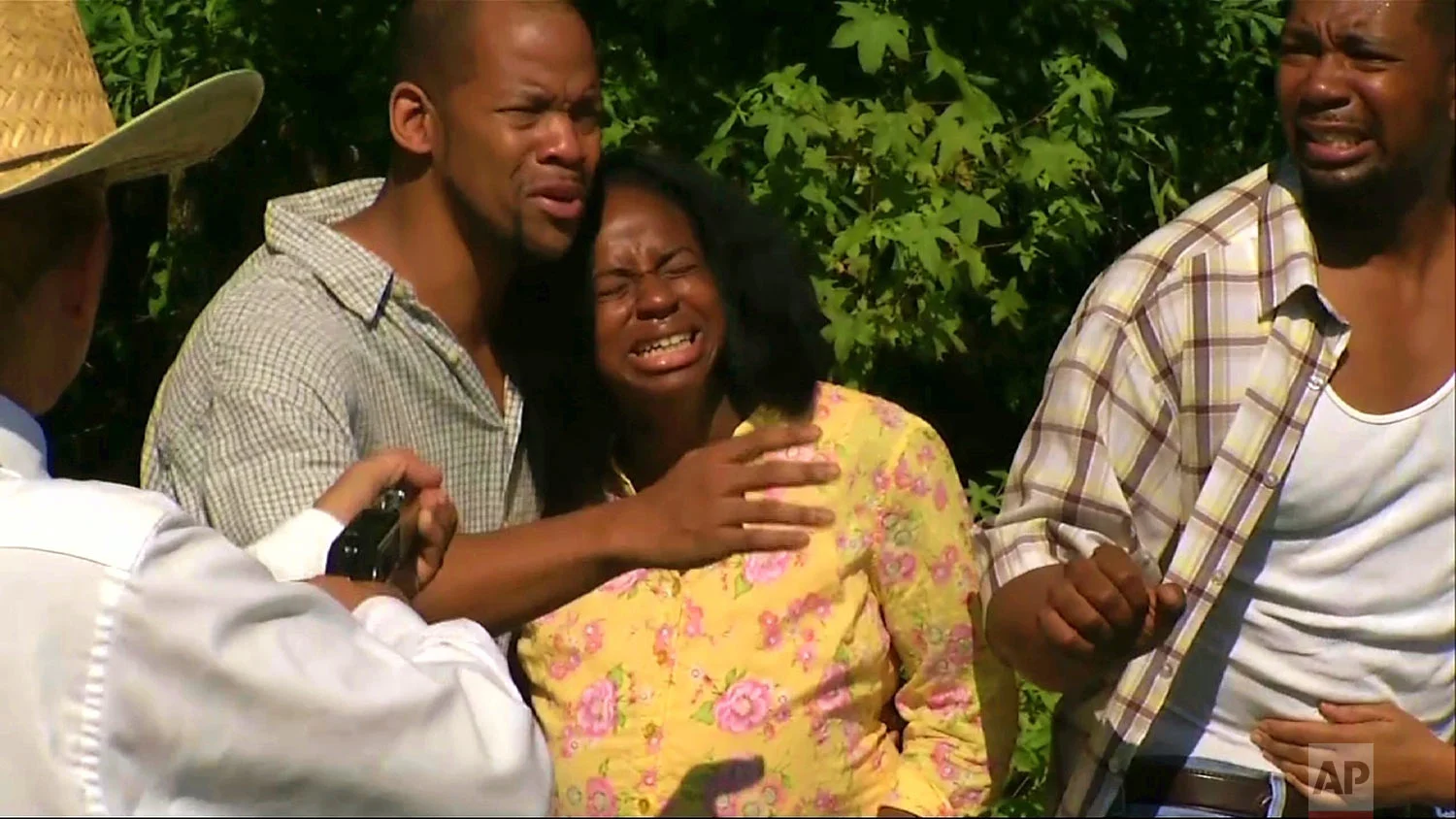 This July 26, 2014, photo shows a reenactment of the Moore’s Ford lynching. The brazen lynching in 1946 of two black couples riding along a rural road in Georgia by a white mob horrified the United States, but a federal grand jury indicted no one in the Moore’s Ford lynching and investigators over the decades since also failed to crack the case. In January 2018, Georgia’s top law enforcement agency closed its latest investigation, just months after the FBI concluded its latest review, saying all the likely killers were dead. (AP Photo/Alex Sanz)