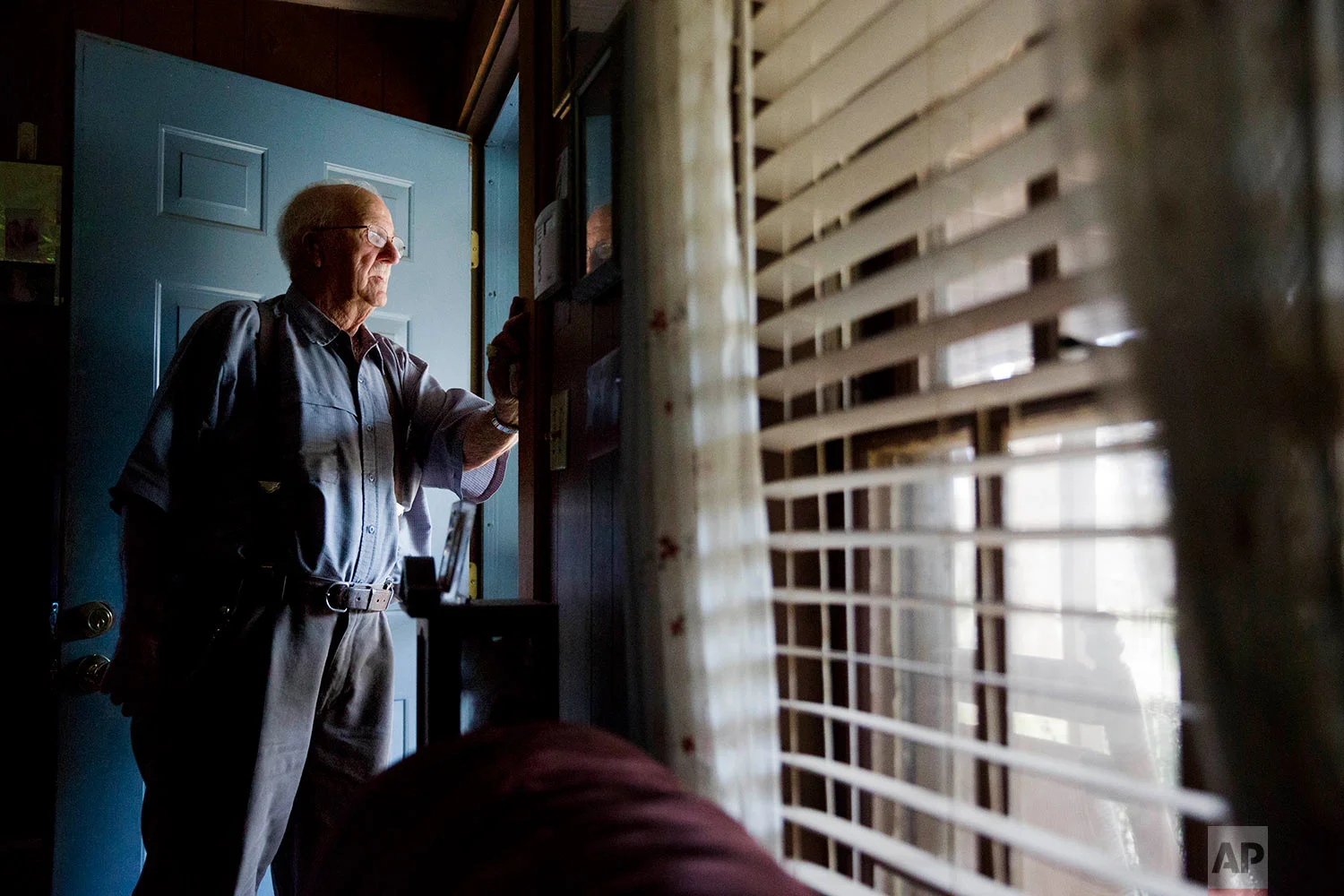 Clinton Adams, believed to be the only living witness to the 1946 lynching of two black couples by a white mob, stands for a portrait in his home in Winder, Ga., Thursday, Feb. 22, 2018. (AP Photo/David Goldman)