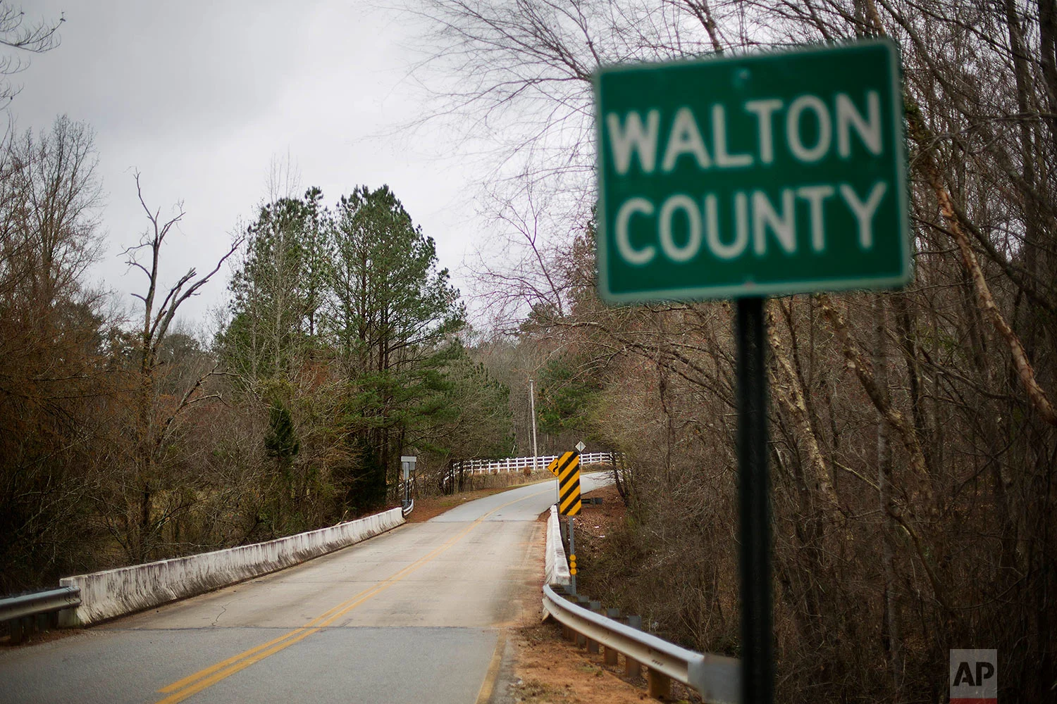 This Feb. 22, 2018 photo shows a bridge that spans the Apalachee River at Moore's Ford Road where in 1946 two young black couples were stopped by a white mob who dragged them to the riverbank and shot them multiple times in Monroe, Ga. (AP Photo/David Goldman)