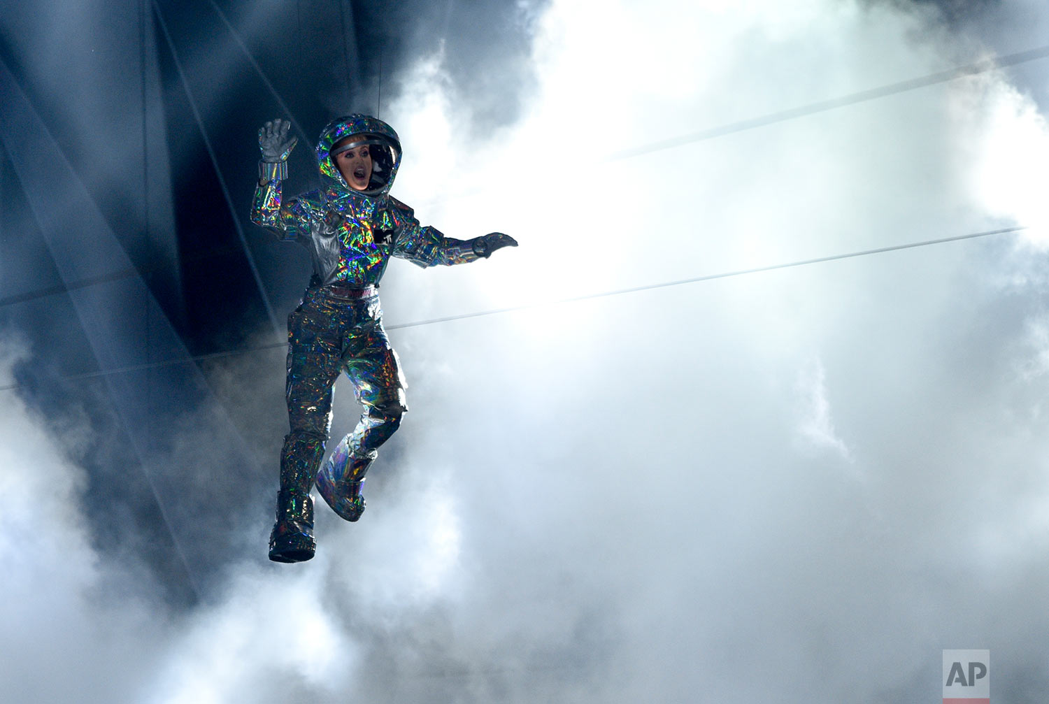  Host Katy Perry is lowered onto the stage at the MTV Video Music Awards at The Forum on Sunday, Aug. 27, 2017, in Inglewood, Calif. (Photo by Chris Pizzello/Invision/AP) 