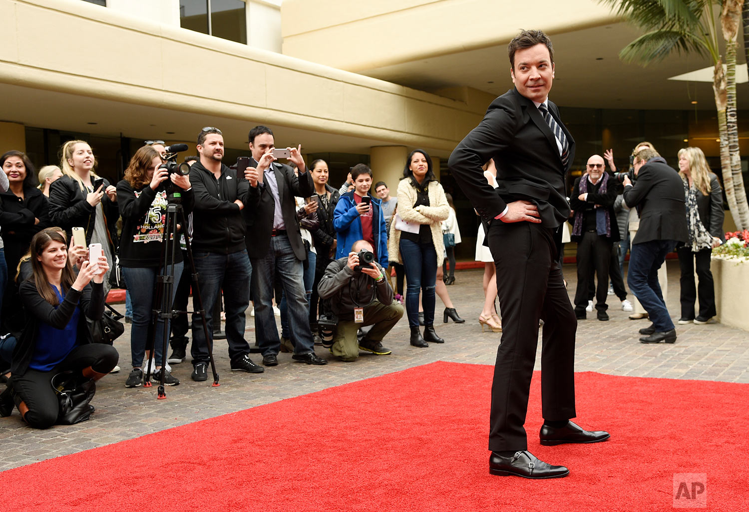  Jimmy Fallon, host of the 74th Annual Golden Globe Awards, strikes a pose after rolling out the red carpet during Golden Globe Awards Preview Day at the Beverly Hilton on Wednesday, Jan. 4, 2017, in Beverly Hills, Calif. The awards will be held on S