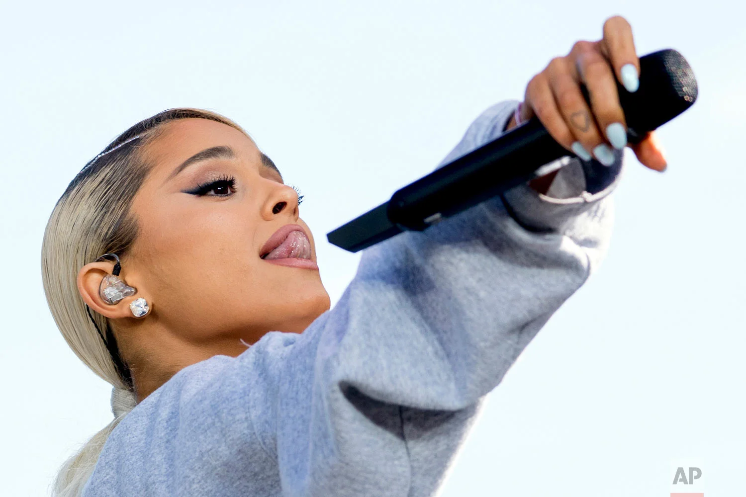 Ariana Grande performs "Be Alright" during the "March for Our Lives" rally in support of gun control in Washington, Saturday, March 24, 2018. (AP Photo/Andrew Harnik)