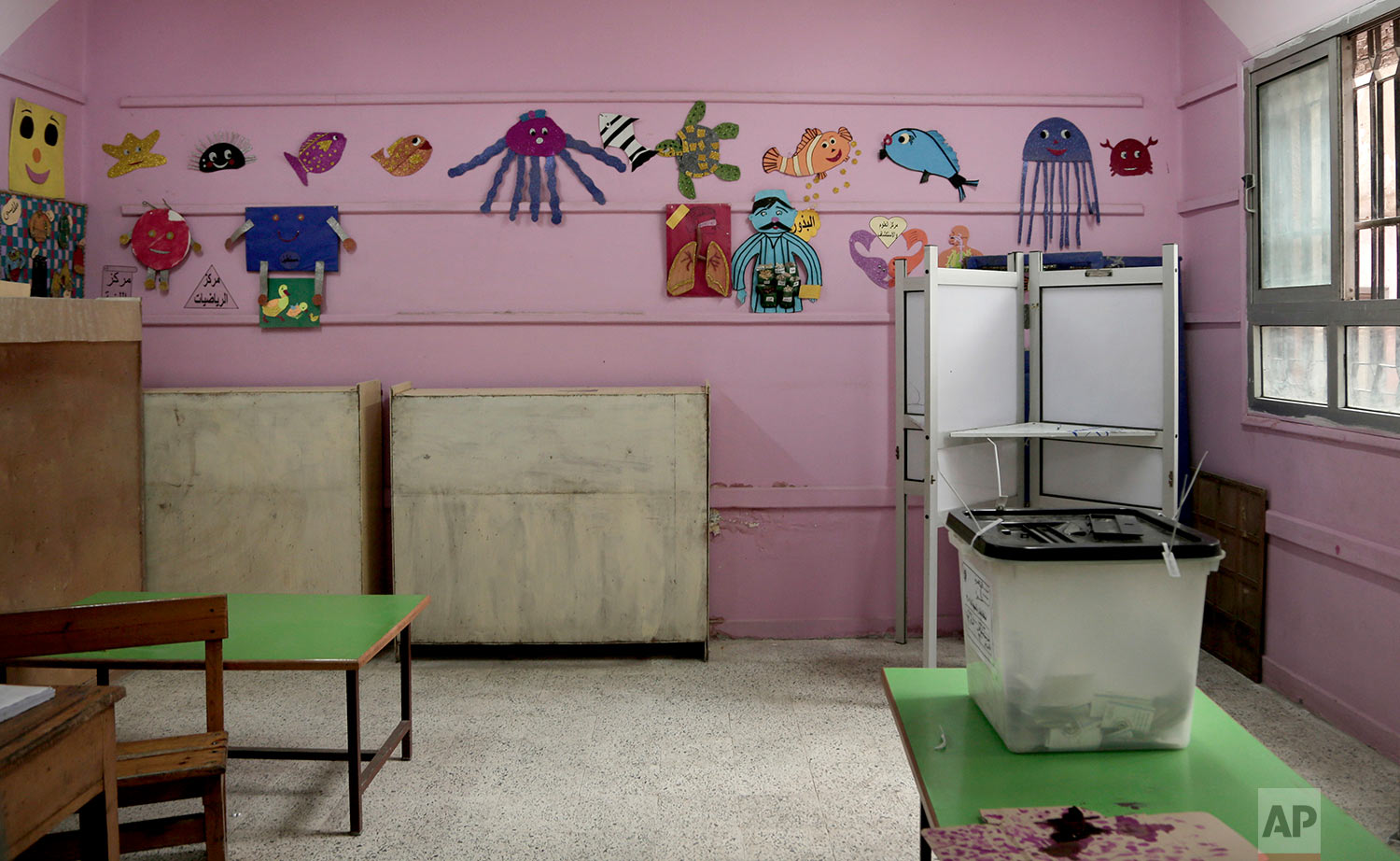 An empty polling station on the third day of the presidential election inside a polling station in the popular district of Shubra, Cairo, Egypt Wednesday, March 28, 2018. (AP Photo/Nariman El-Mofty)