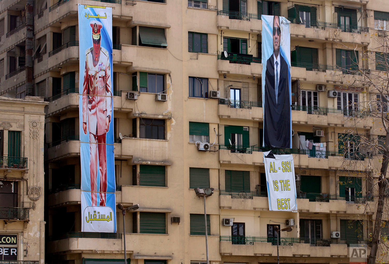  In this Thursday, March 22, 2018 photo, election banners for Egyptian President Abdel-Fattah el-Sissi, hang in Tahrir Square, which was the focal point of the Jan. 25, 2011 Egyptian uprising, in Cairo, Egypt. Seven years ago, Cairo’s Tahrir Square was filled with tens of thousands of Egyptians demanding change. Now it is festooned with portraits of the president, vowing continuity. Almost all traces of the popular revolt that overthrew autocrat Hosni Mubarak in 2011 are now gone. (AP Photo/Amr Nabil)