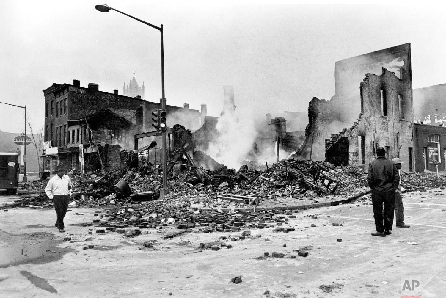  7th and O street NW, 1968. Smoldering ruins remain where a building stood on 7th Street, N.W. in Washington, D.C., April 6, 1968. Numerous fires accompanied the second night of turmoil in the nation's capital following the assassination of Dr. Marti