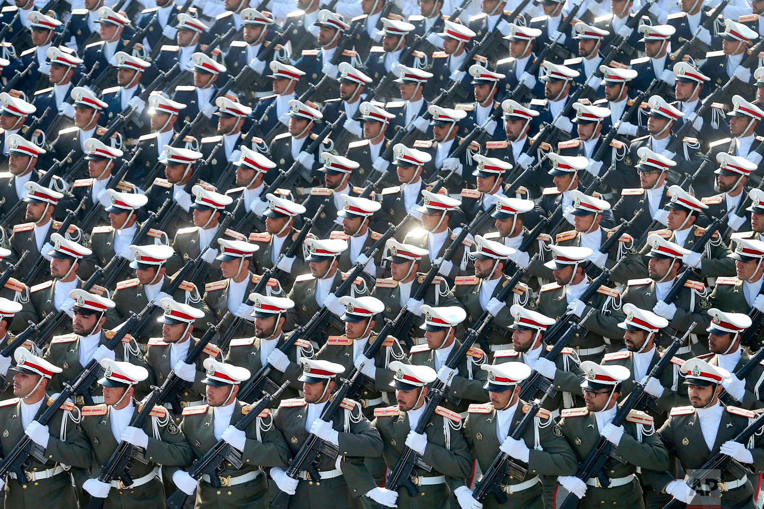  Troops march in a parade marking National Army Day in front of the mausoleum of the late revolutionary founder Ayatollah Khomeini, outside Tehran, Iran, Wednesday, April 18, 2018. (AP Photo/Ebrahim Noroozi) 