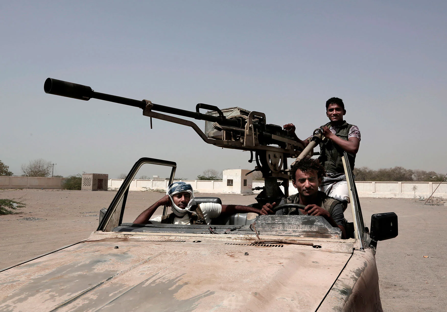 n this Feb. 12, 2018 photo, young Saudi-led backed forces, part of Ahmed Al-Kawkabani's southern resistance unit in Hodeida, petrol al-Khoukha, Yemen. (AP Photo/Nariman El-Mofty)