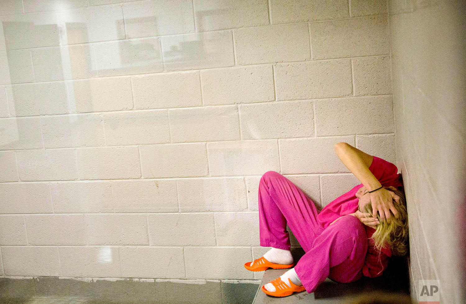  Jessica Morgan, high on methamphetamines and the opioid pain medication Opana, sits in a holding cell after being booked for drug possession at the Campbell County Jail in Jacksboro, Tenn., Monday, April 23, 2018. (AP Photo/David Goldman)    