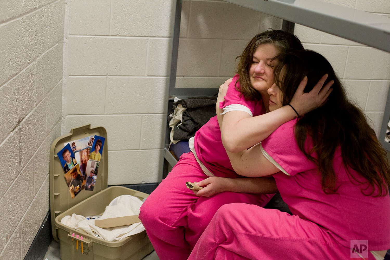  Crystal French, left, is comforted by cellmate Krystle Sweat, at the Campbell County Jail in Jacksboro, Tenn., Tuesday, March 30, 2018, after French was denied parole the previous day. She won't be eligible again for another year. (AP Photo/David Go