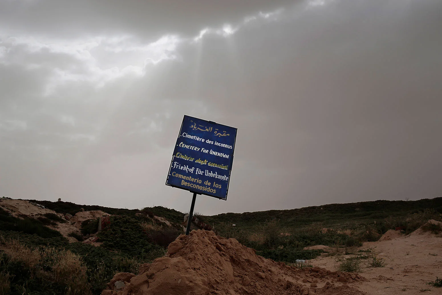 This Sunday, April 15, 2018 photo shows the "Cemetery of the Unknown," where migrants who were found dead on nearby shores are buried, in the port town of Zarzis, Tunisia. (AP Photo/Nariman El-Mofty)